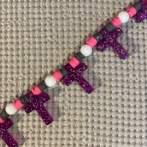 colorful cross clay bead bracelet with clear string . when check out chose color